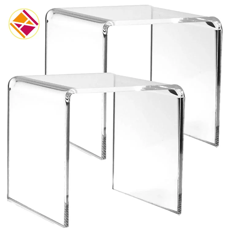 Risers de acrílico em forma de U.